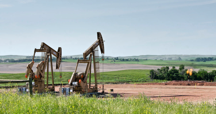 fracking derricks on the plain